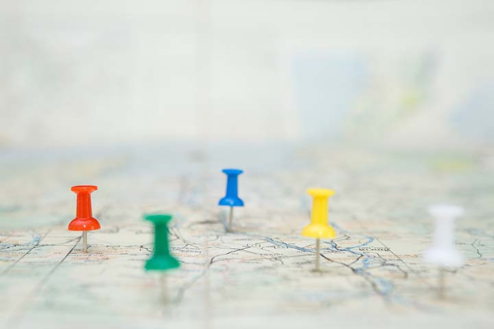 Selective focus of Colorful Many pins on map background